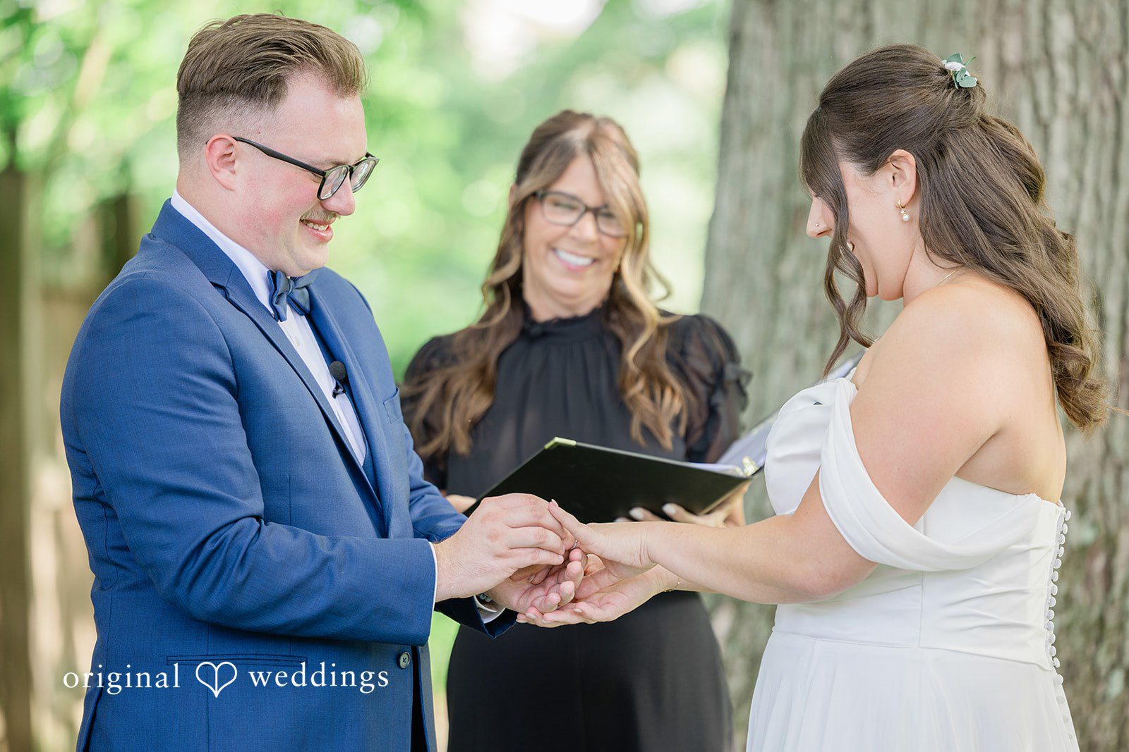 Emily + Joshua Couple exchanging the rings during ceremony at Whitehall Columbia.