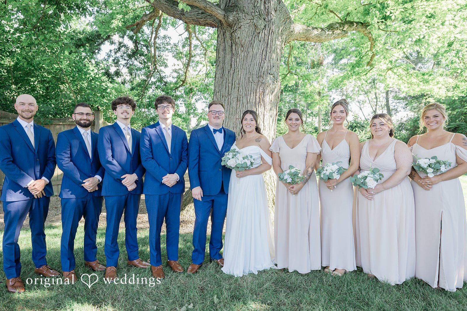 Emily + Joshua Couple with bridesmaids and groomsmen at Whitehall Columbia captured by Cleveland Wedding Photographers from Original Weddings.