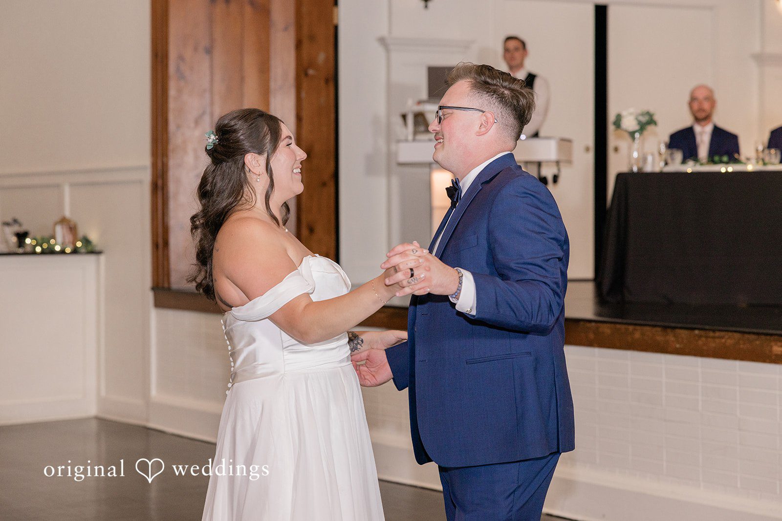 Emily + Joshua Happy bride and groom enjoying their wedding reception dance together.