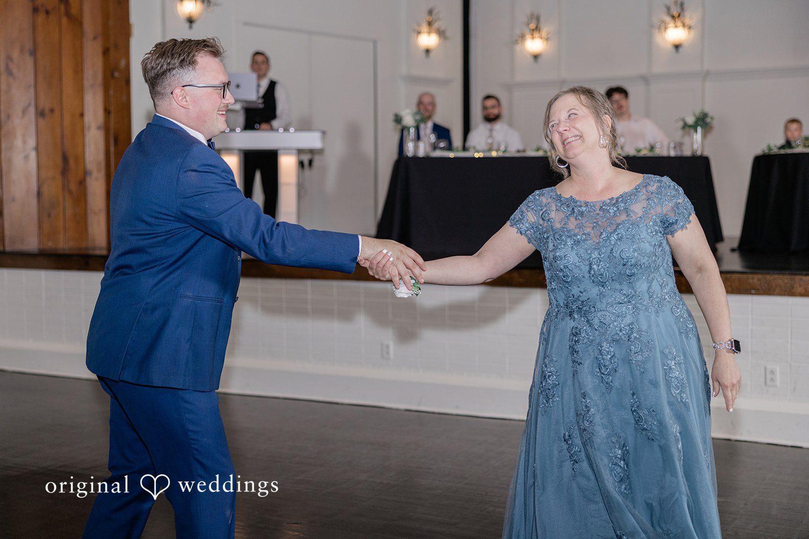 Emily + Joshua Happy groom celebrating with energetic dance moves at Whitehall Columbia.