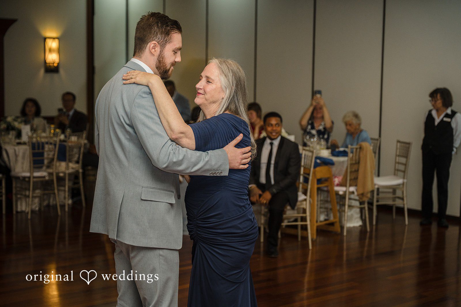 Ava + Zach Wedding guests dancing and enjoying the music on the dance floor.
