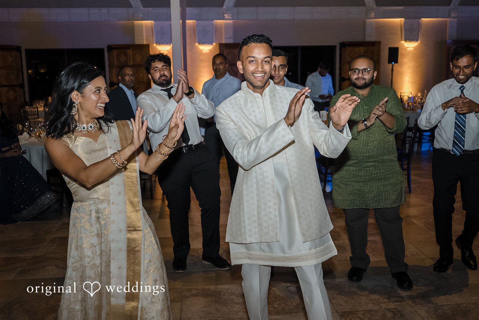 Kathir + Nandita Couple and wedding guest are dancing together.