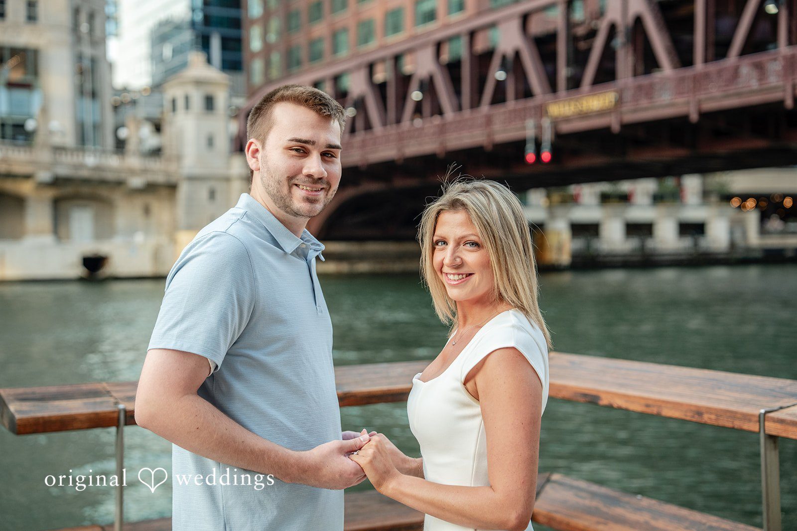 Our Chicago engagement photographers at Original Weddings captured a beautiful portrait of the couple at the Chicago Riverwalk