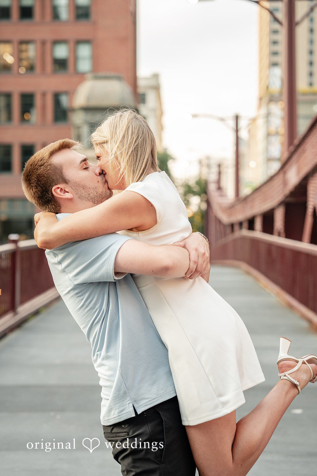 Amy + Michael Our Chicago engagement photographers captured the moment the groom lifted the bride and they shared a kiss