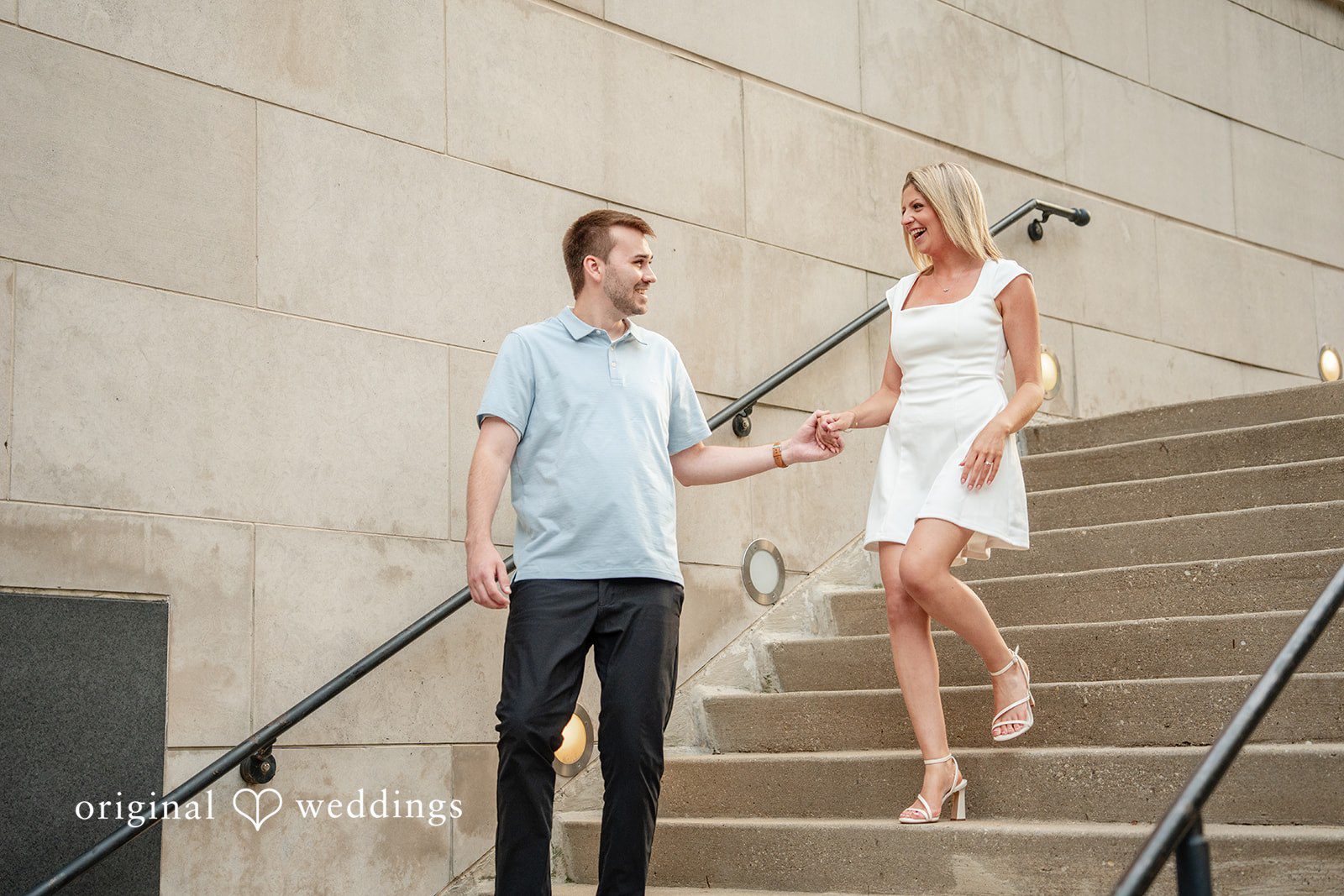 Amy + Michael Our Chicago engagement photographers captured the moment the couple walked down the stairs happily