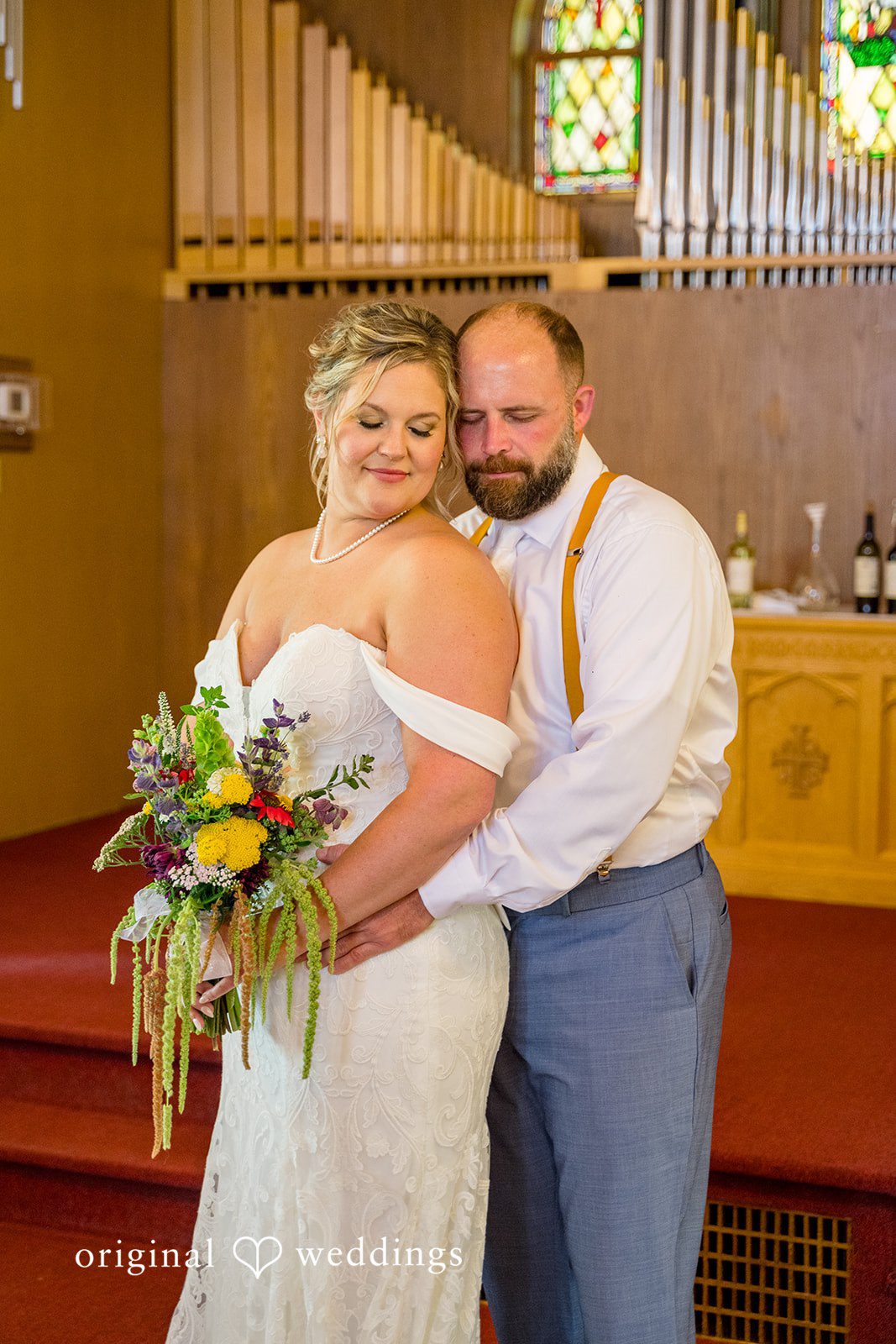 Stunning Portrait of Couple at Floral Hall by Minneapolis Wedding Photographers from Original Weddings.