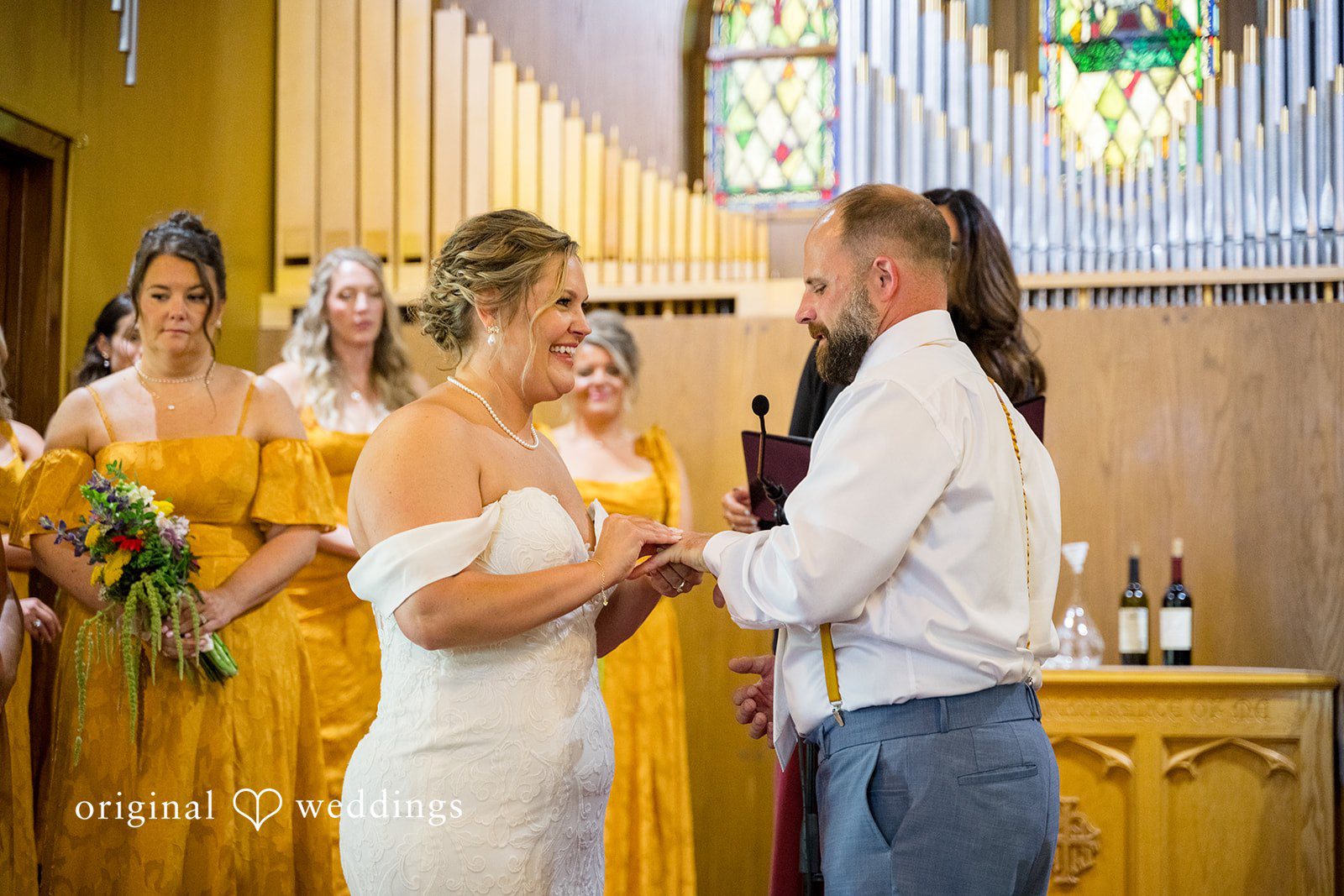A bride and groom sharing an intimate moment together during their wedding reception.