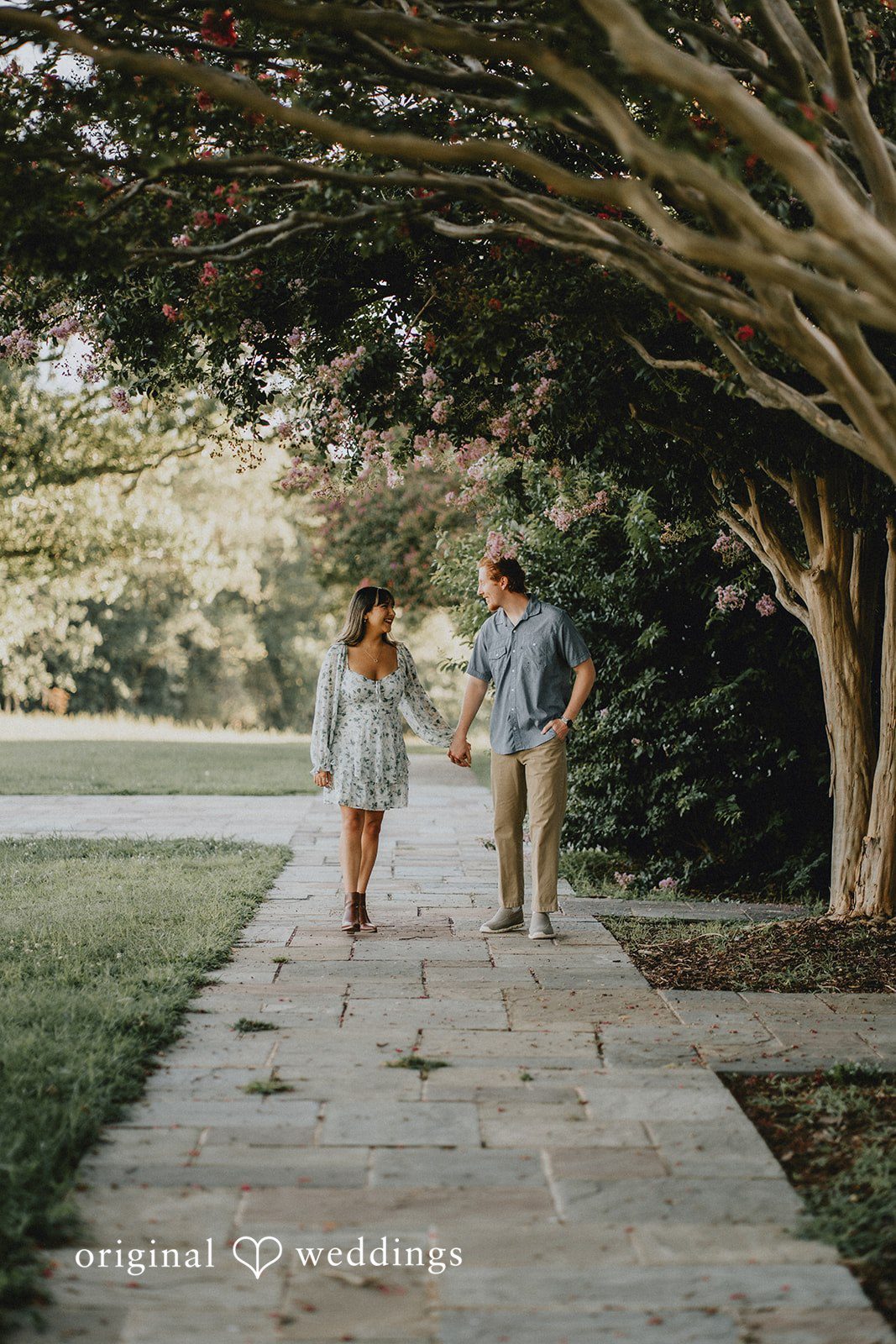 The couple takes a walk through the park