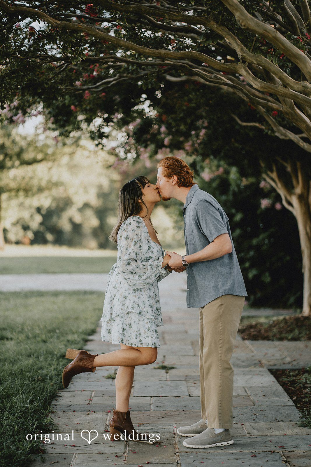 The couple shares a kiss