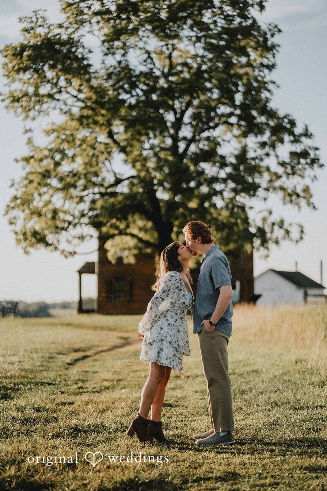 The couple shares a romantic kiss