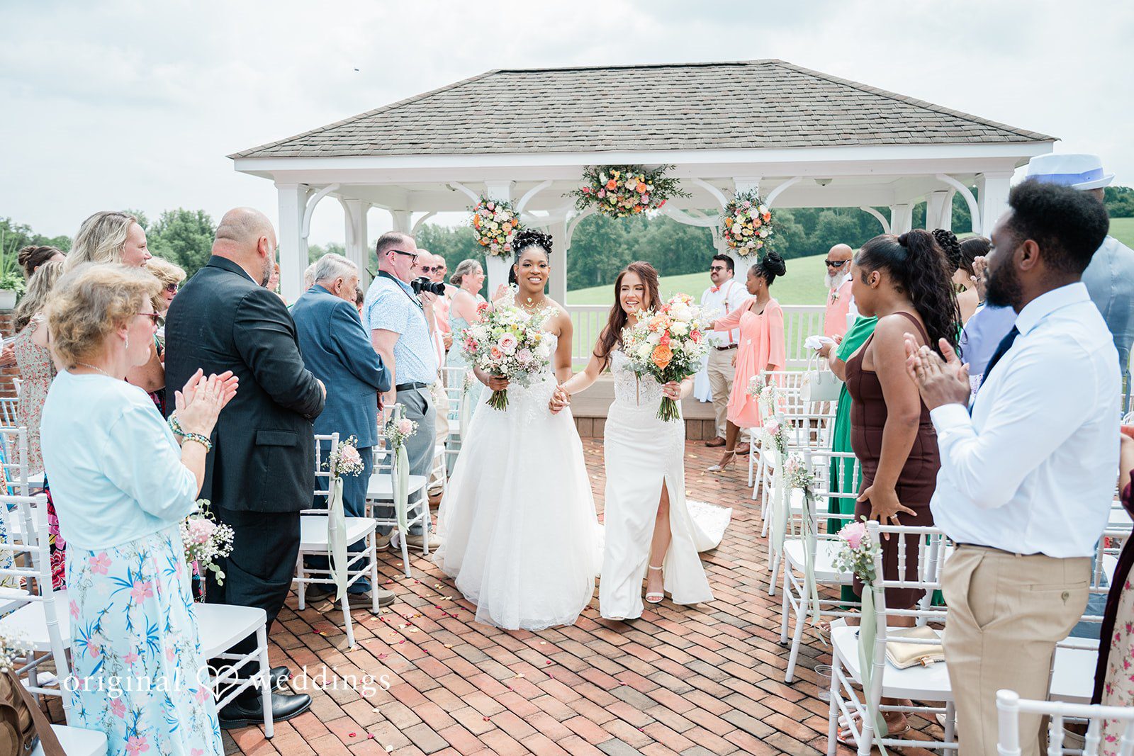 The couple makes a joyful exit