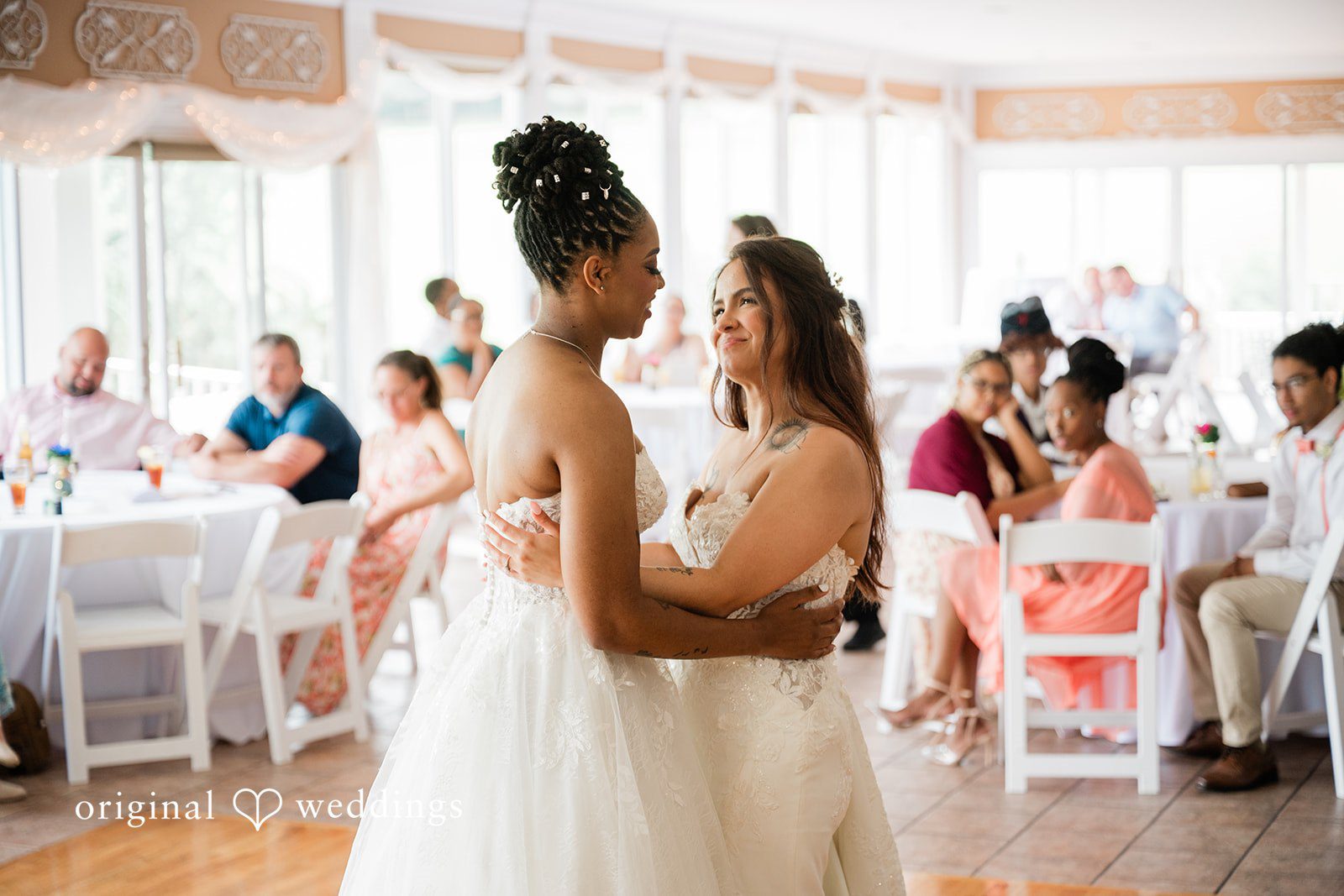 The couple takes their first dance