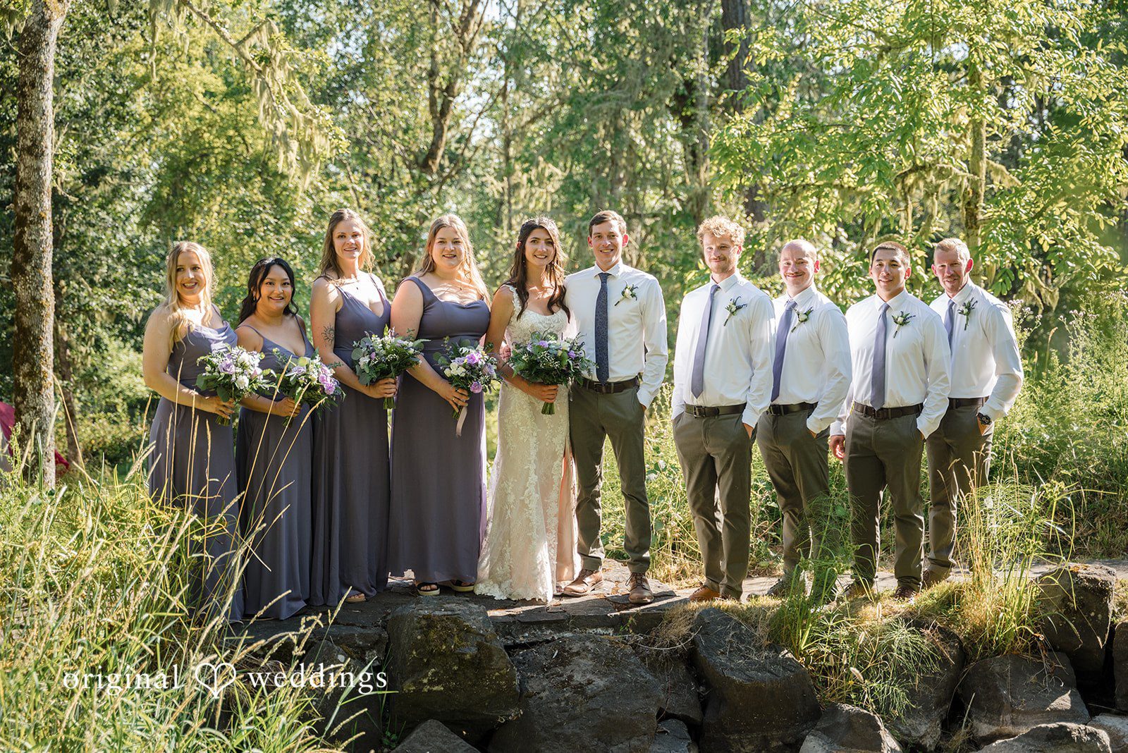 Nikkole + Grant Our Portland wedding photographers captured a beautiful portrait of the couple and their bridal party in the outdoors at Mount Tom House
