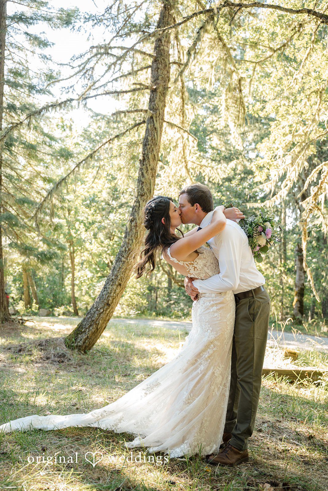 Nikkole + Grant The couple shares a romantic kiss