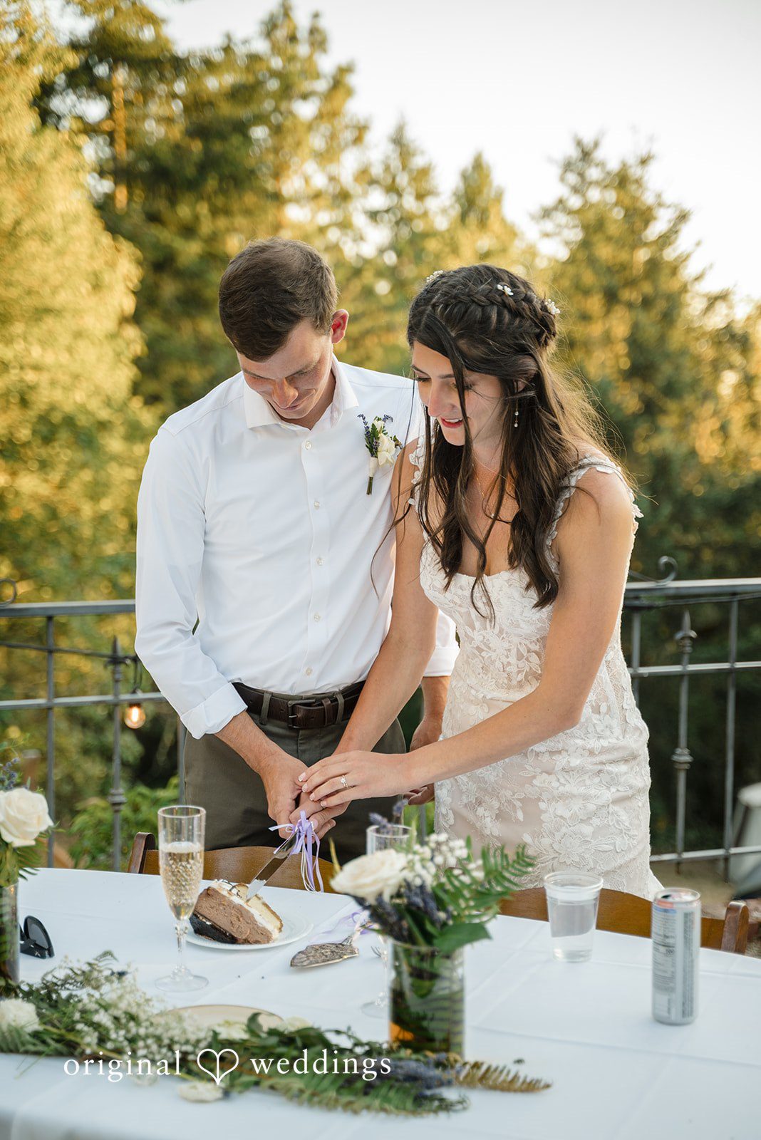 Nikkole + Grant The couple cuts their cake