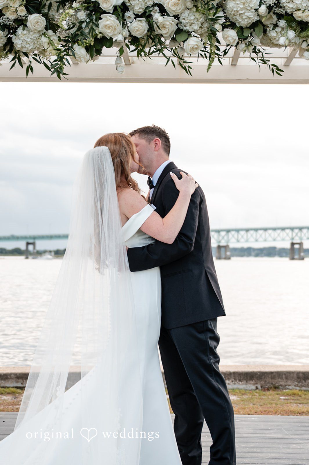The couple takes their first kiss