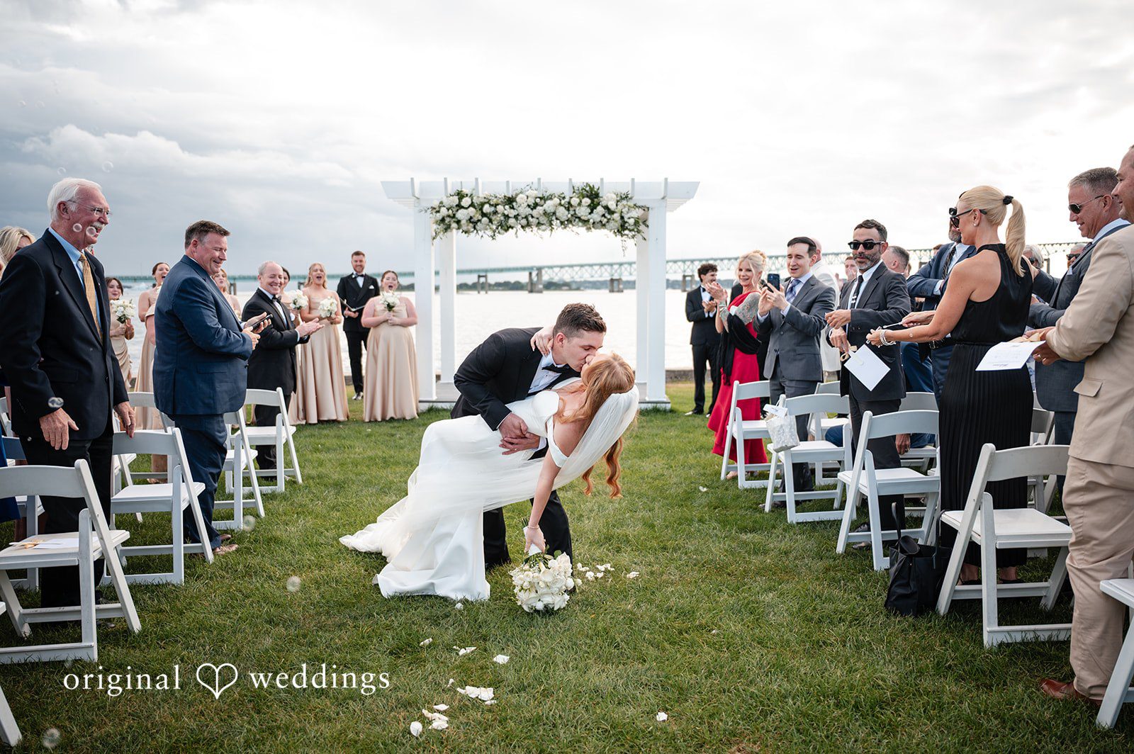 Our Providence wedding photographers captured a romantic portrait of the couple on the wedding aisle at Officer's Club