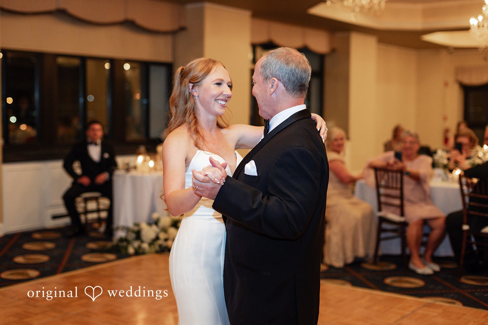 The bride dances with her father