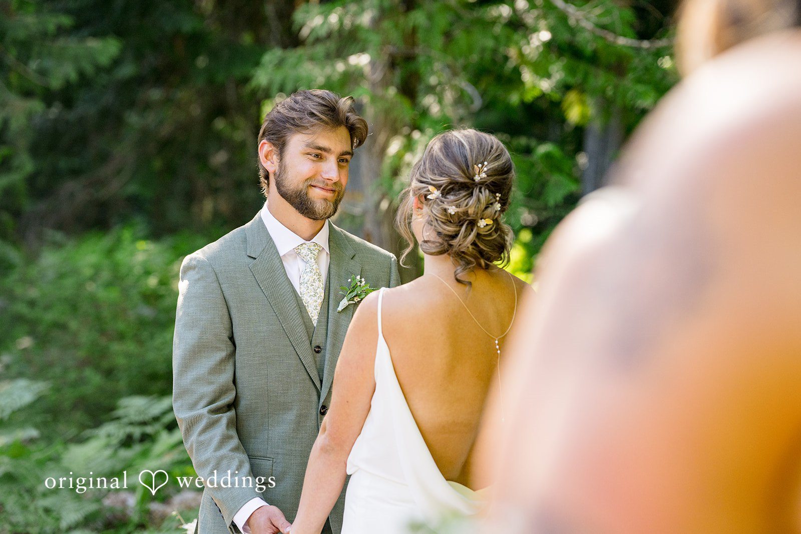 Abigail + Reece A bride and groom standing at the altar during their vows.