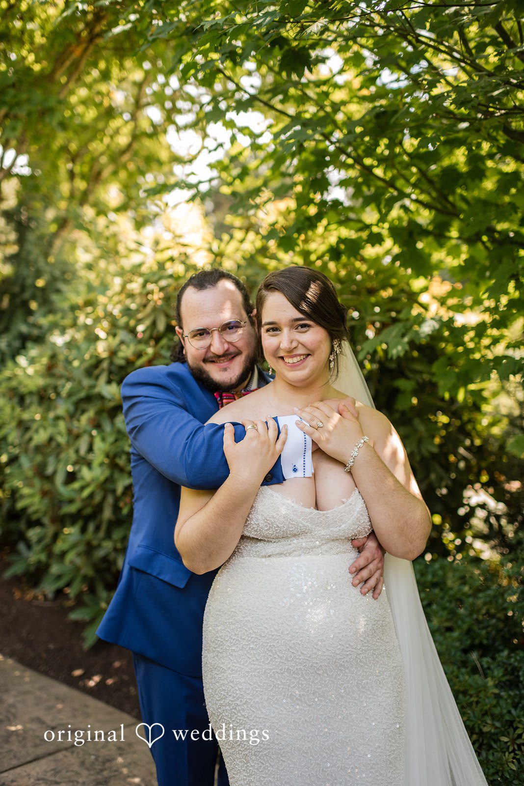 Diego + Adel Stunning Portrait of couple at Pine Creek Nursery by Seattle Wedding Photographers from Original Weddings.