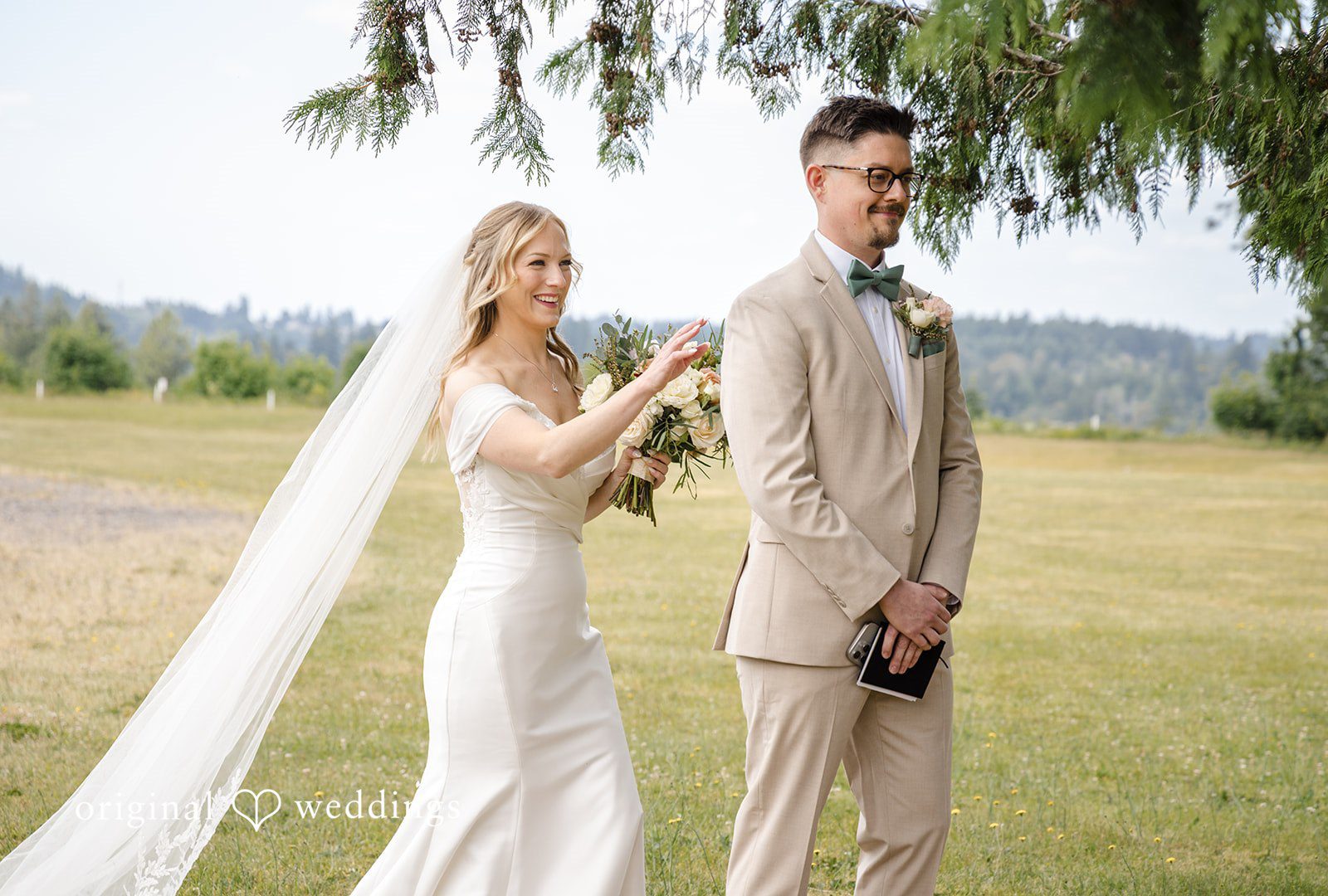 A bride and groom standing side-by-side during their wedding ceremony.
