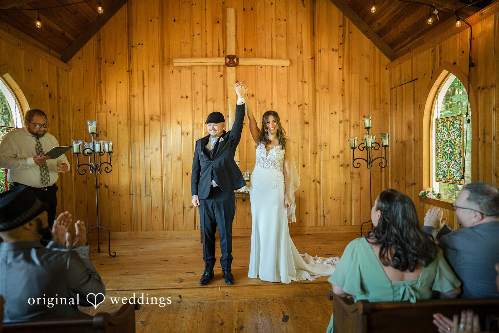 Jade + Nicholas A bride and groom standing after wedding ceremony.