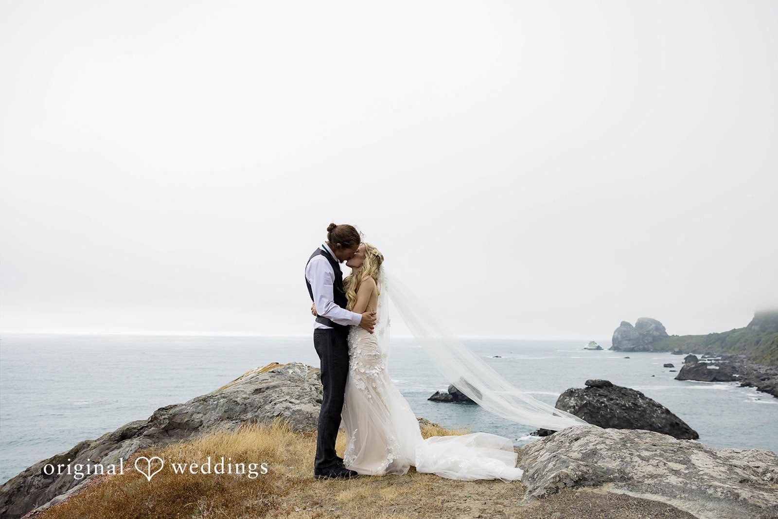 Brittany + Evan The couple shares a romantic kiss