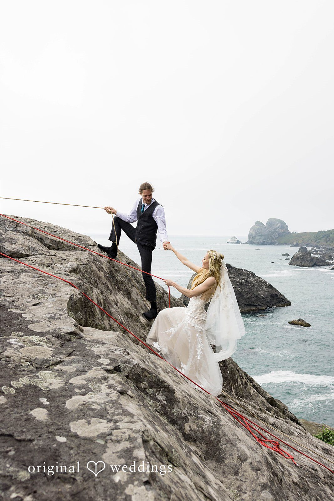 Brittany + Evan Climbing the cliff