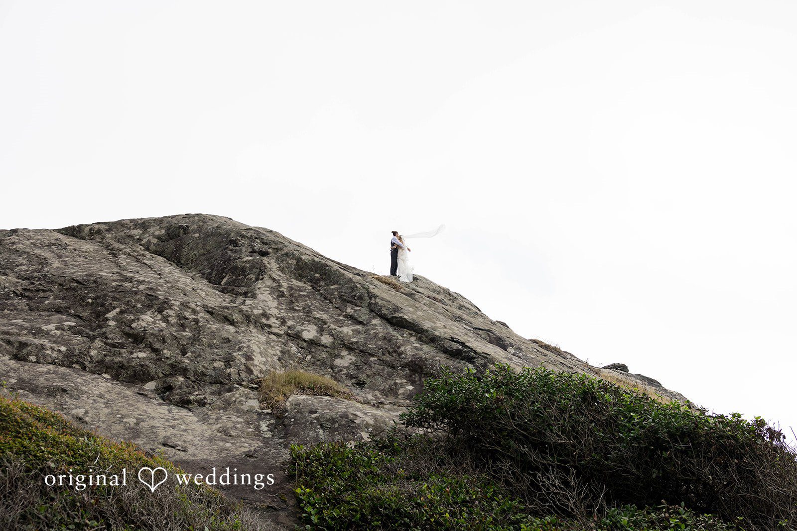 Brittany + Evan Portrait on the cliff