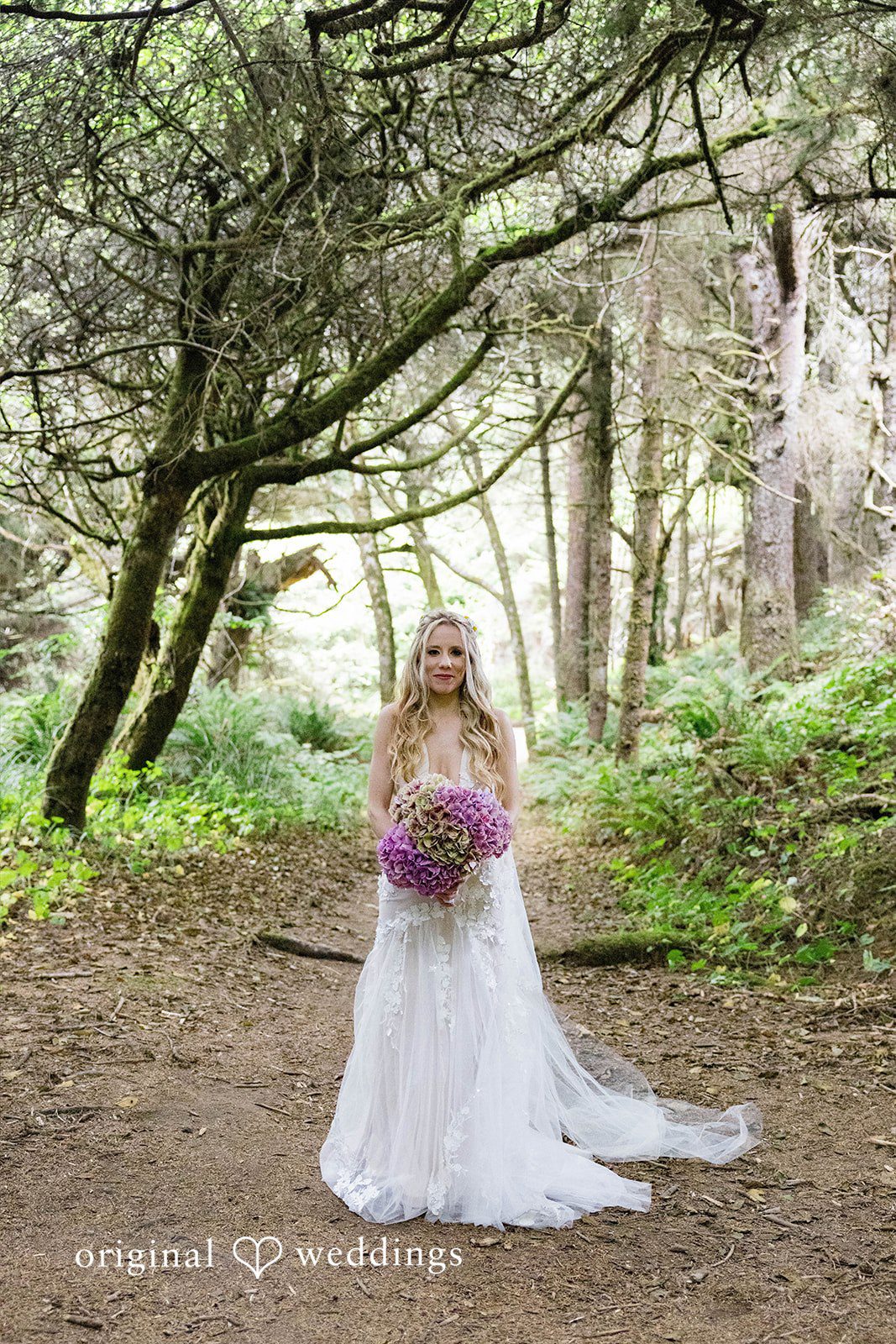 Brittany + Evan Our Portland wedding photographers captured a beautiful portrait of the bride at the Hidden Beach