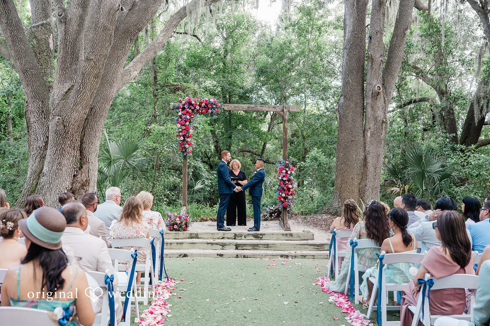 Justin and Alvin wedding portrait at Secret Garden at Paradise Spring captured by Tampa wedding photographers.