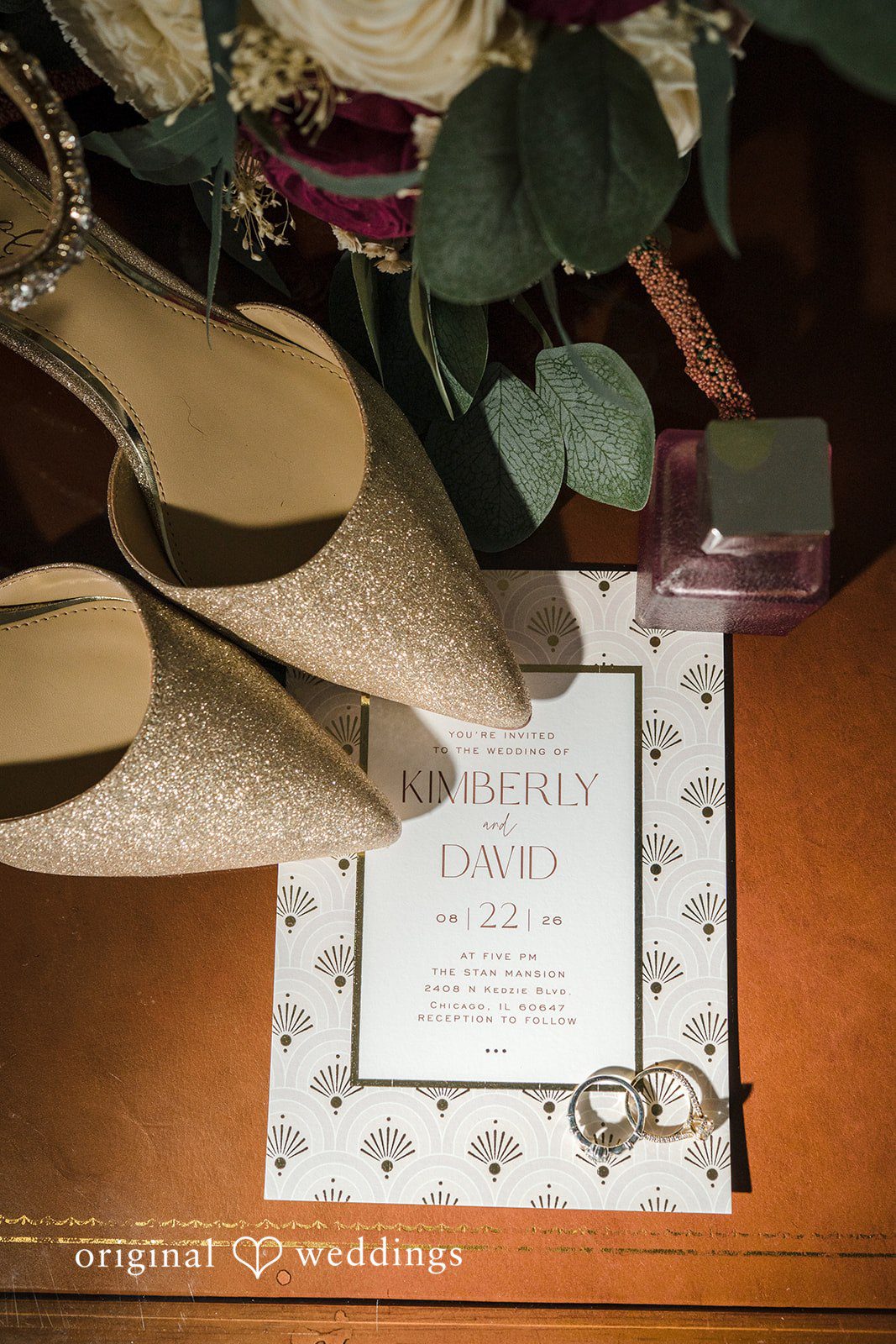Kimberly + David Flat lay arrangement of elegant wedding invitation stationery.