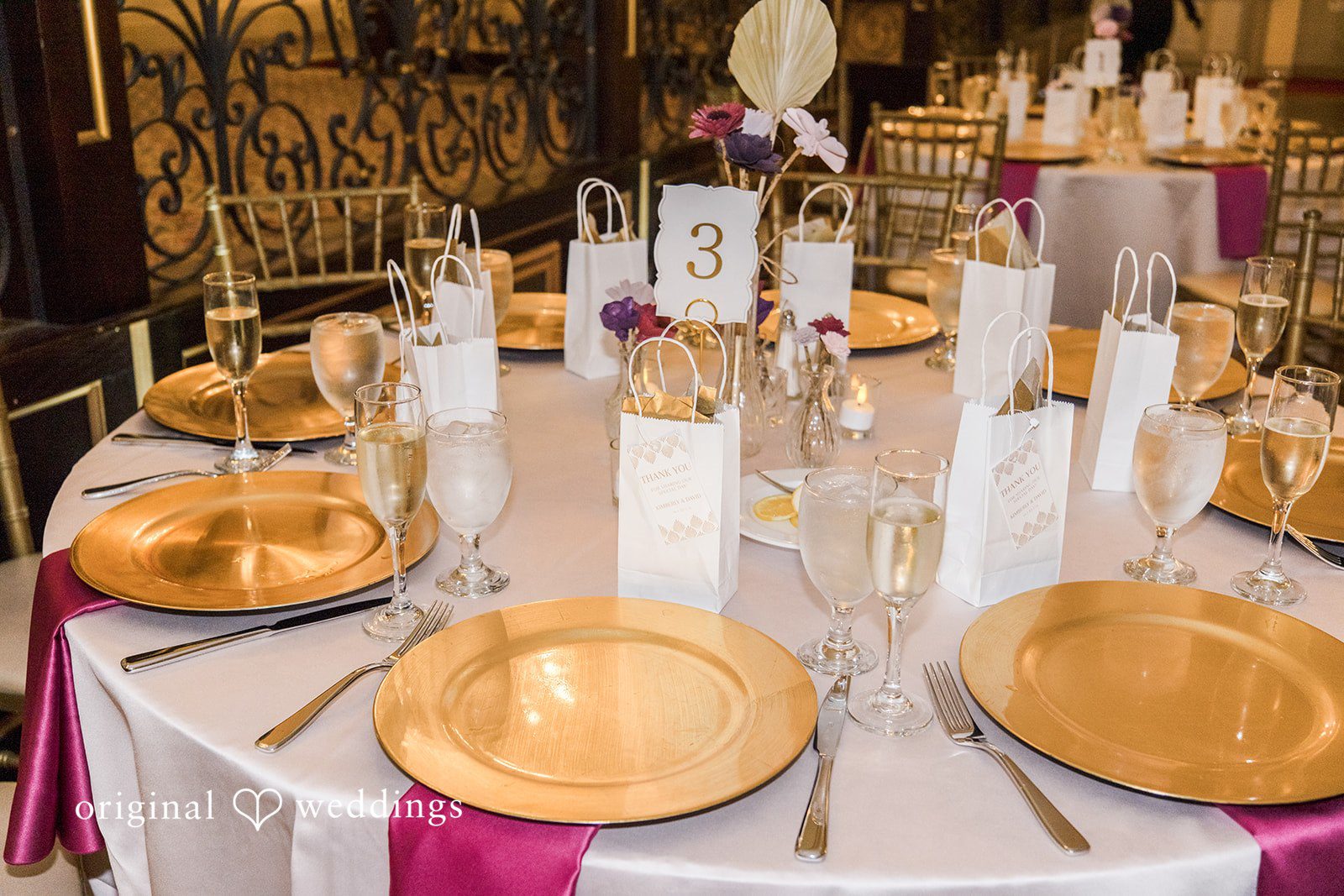 Kimberly + David Close-up of a wedding place setting with a gold plate.