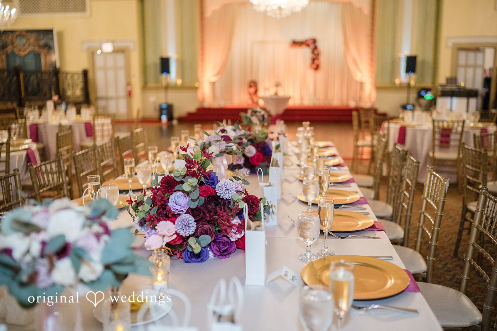 Kimberly + David Banquet table decorated with a colorful floral runner.