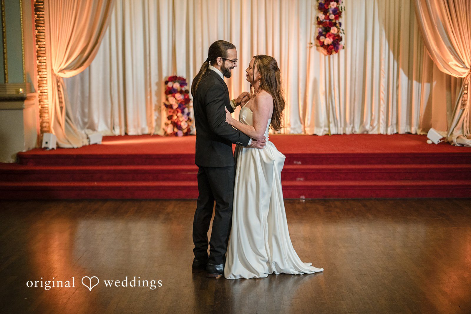 Kimberly + David Newlyweds enjoying a romantic dance at their reception.