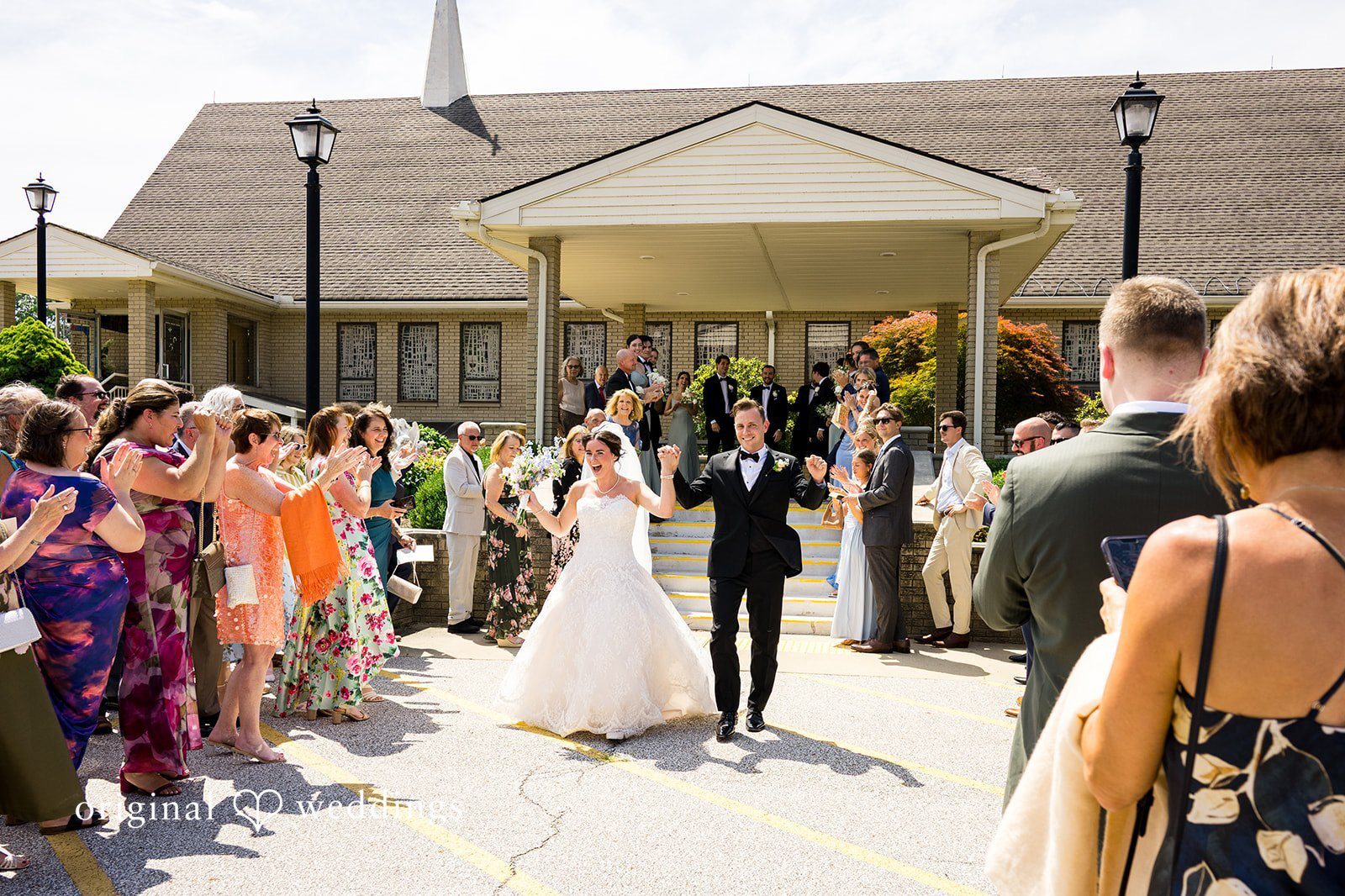 Sarah and Kyle walking down the aisle after their ceremony at Standing Rock Farms captured by Cleveland wedding photographers.