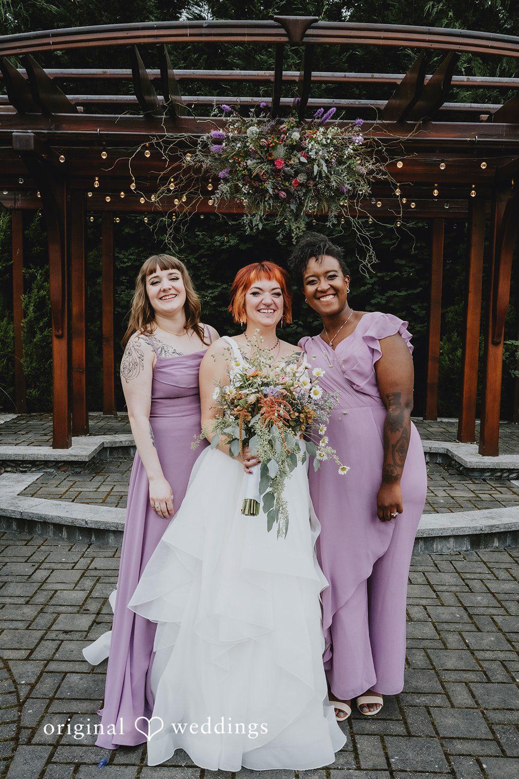 McKenna + Patrick A beautiful portrait of the bride and her bridesmaids