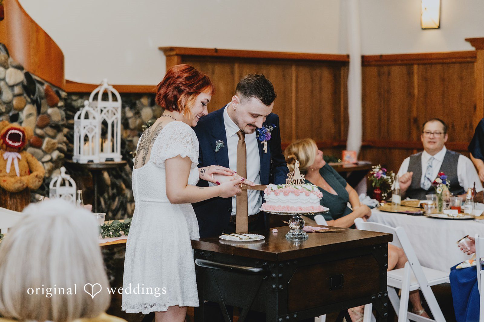 McKenna + Patrick The couple cuts their wedding cake
