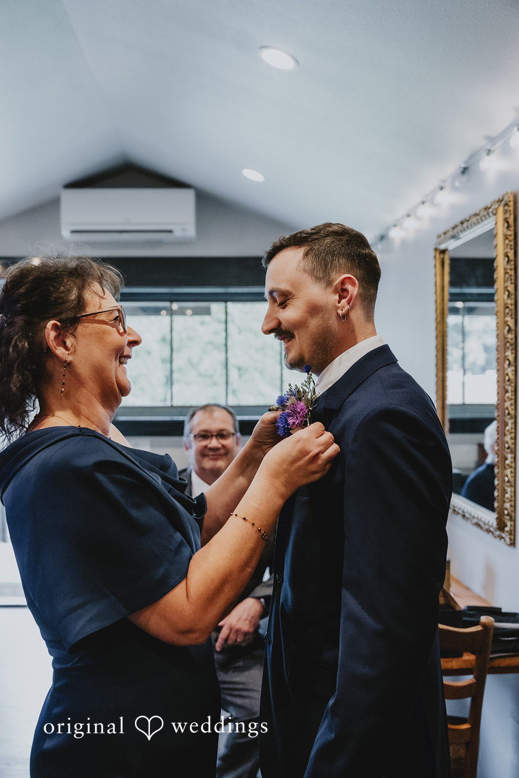 McKenna + Patrick The groom's mum gets the groom all set