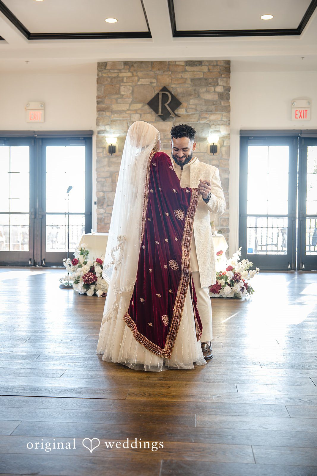 Neha + Andrew The couple takes their first dance