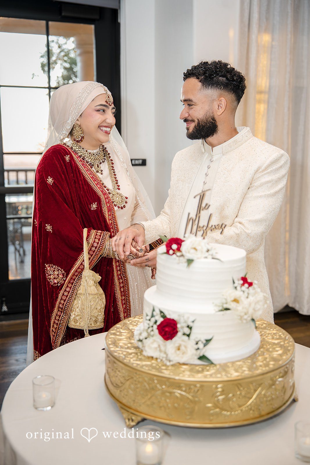 Neha + Andrew The couple cuts their wedding cake