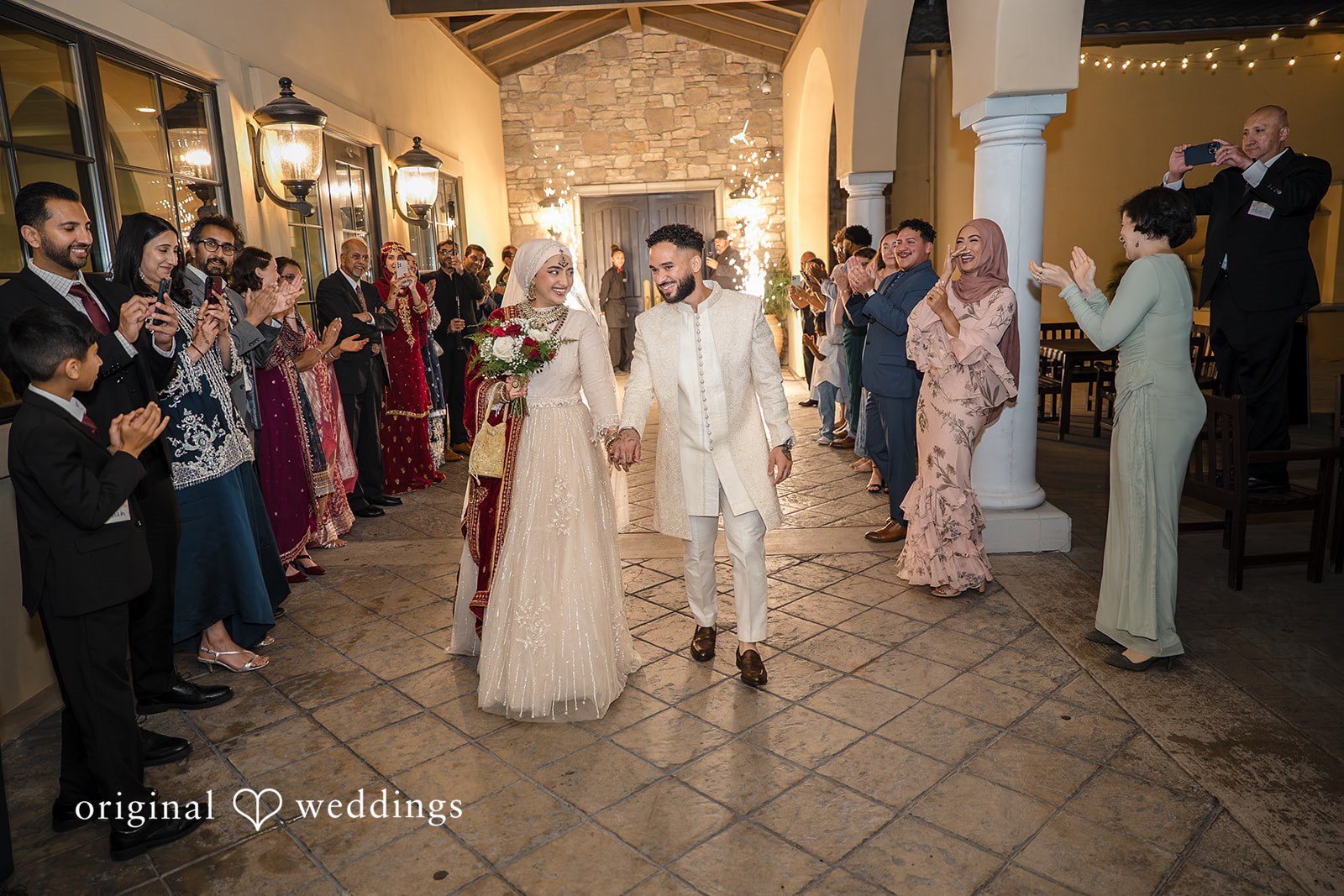 Neha + Andrew The couple makes a grand exit