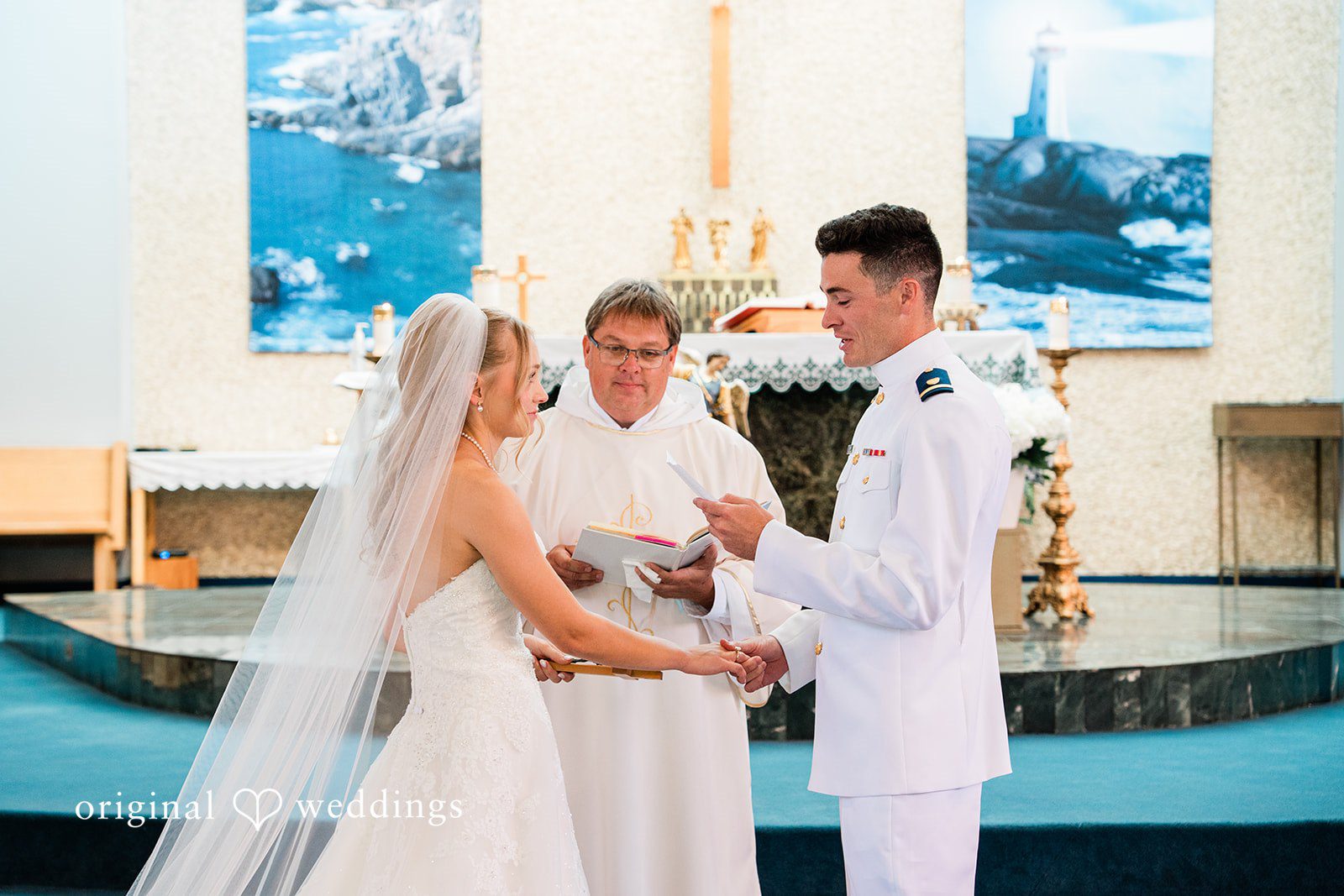 Veronica + Wyatt A wedding ceremony in progress at the altar of a church.