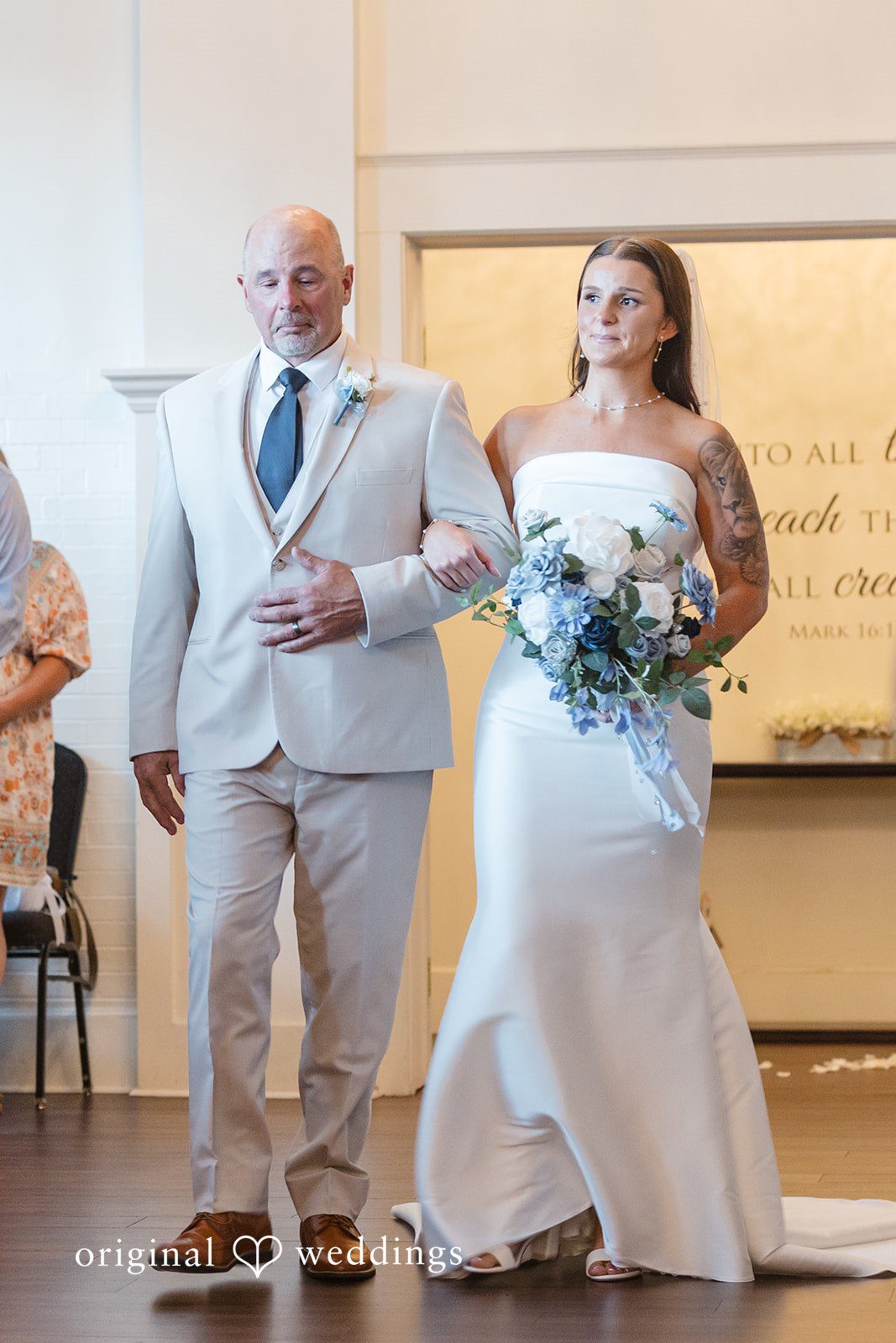 Jaclyn + Mason A bride and man walking down the aisle.