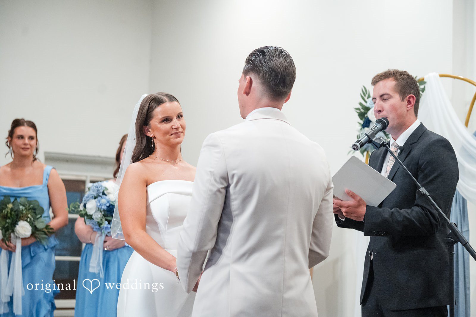 Jaclyn + Mason Bride and groom smiling together during the wedding event.