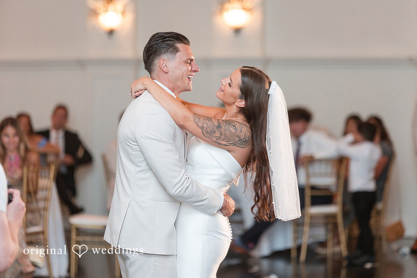 Jaclyn + Mason Bride and groom sharing an intimate moment during their reception.