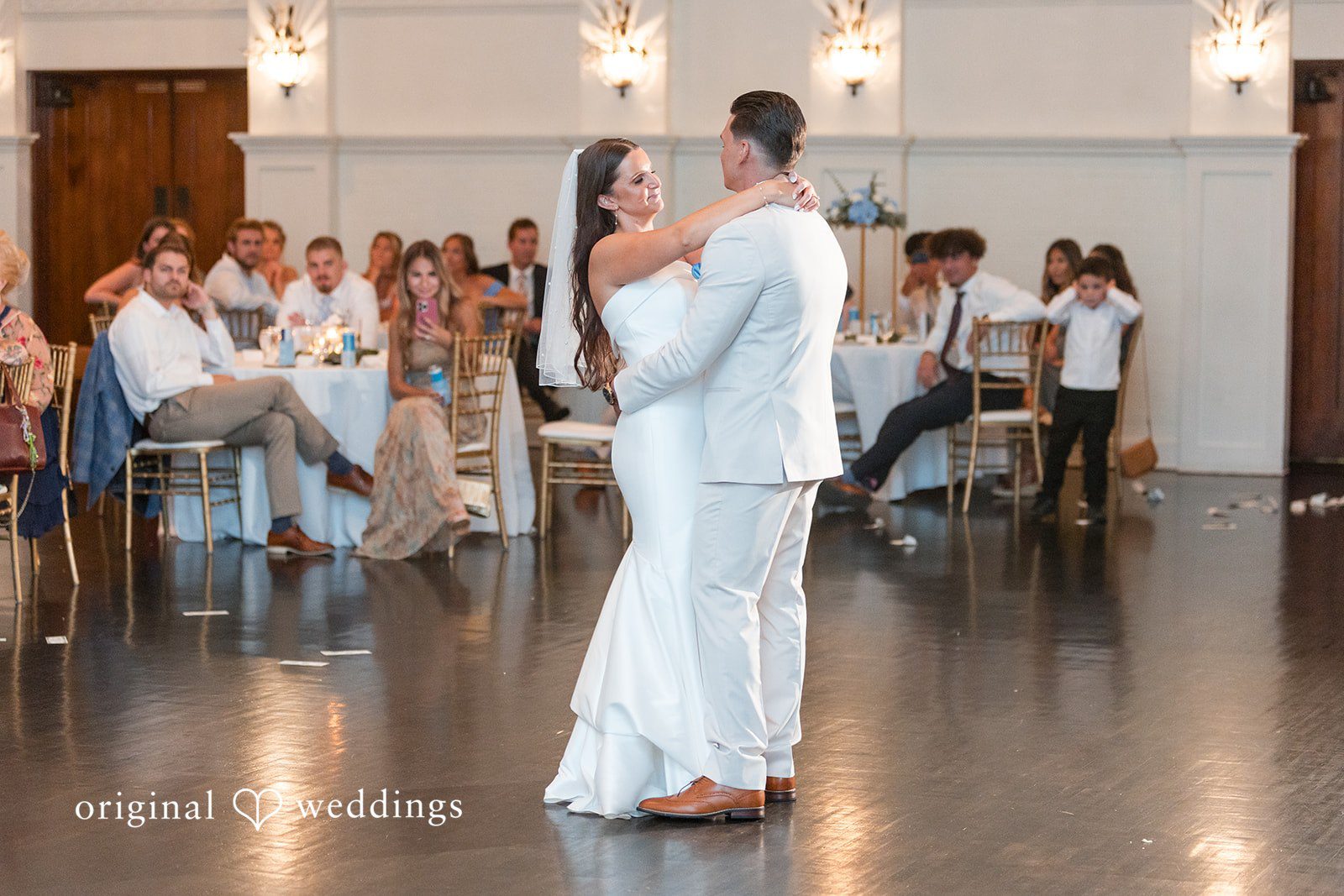 Jaclyn + Mason Bride and groom dancing together on the dance floor.