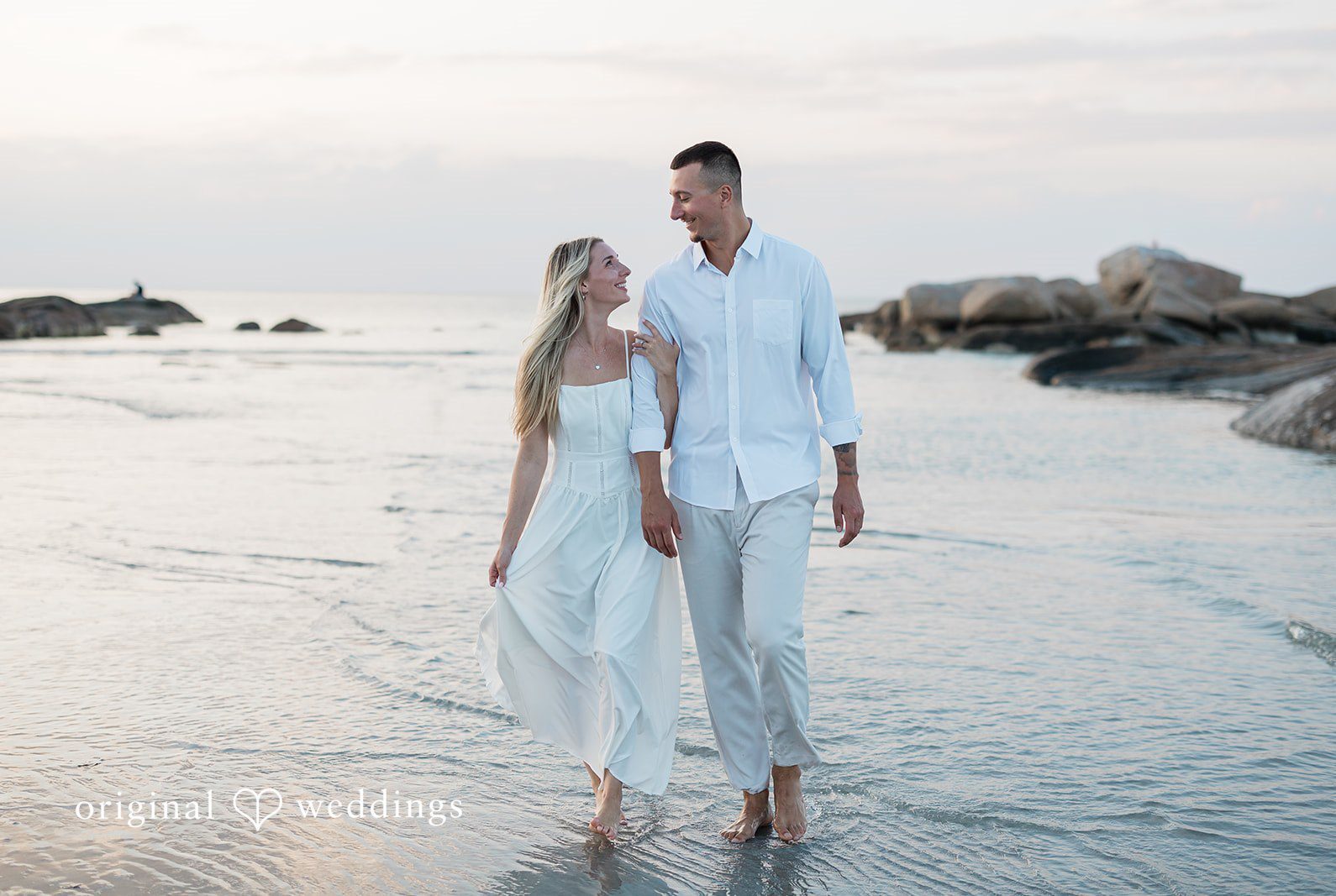 Stunning portrait of couple at Wingaersheek Beach by Boston Engagement Photographers from Original Weddings.