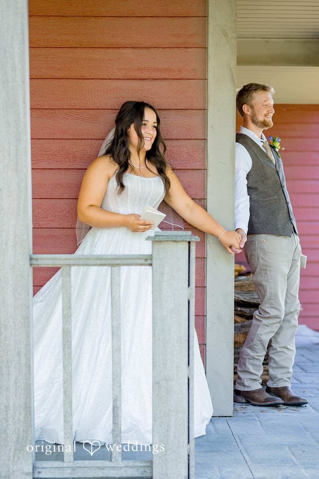 Melayna + Harley A bride walks down the steps of a porch toward her groom.