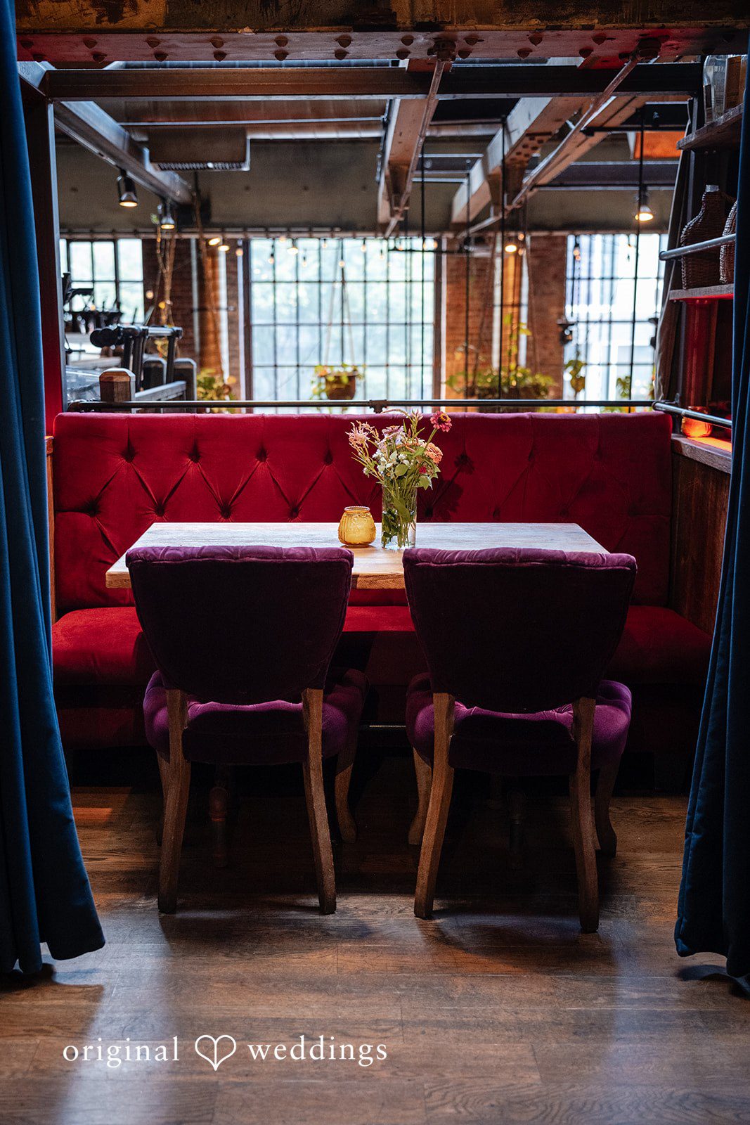 Claudio + Claire Red velvet booth seating inside Ainslie